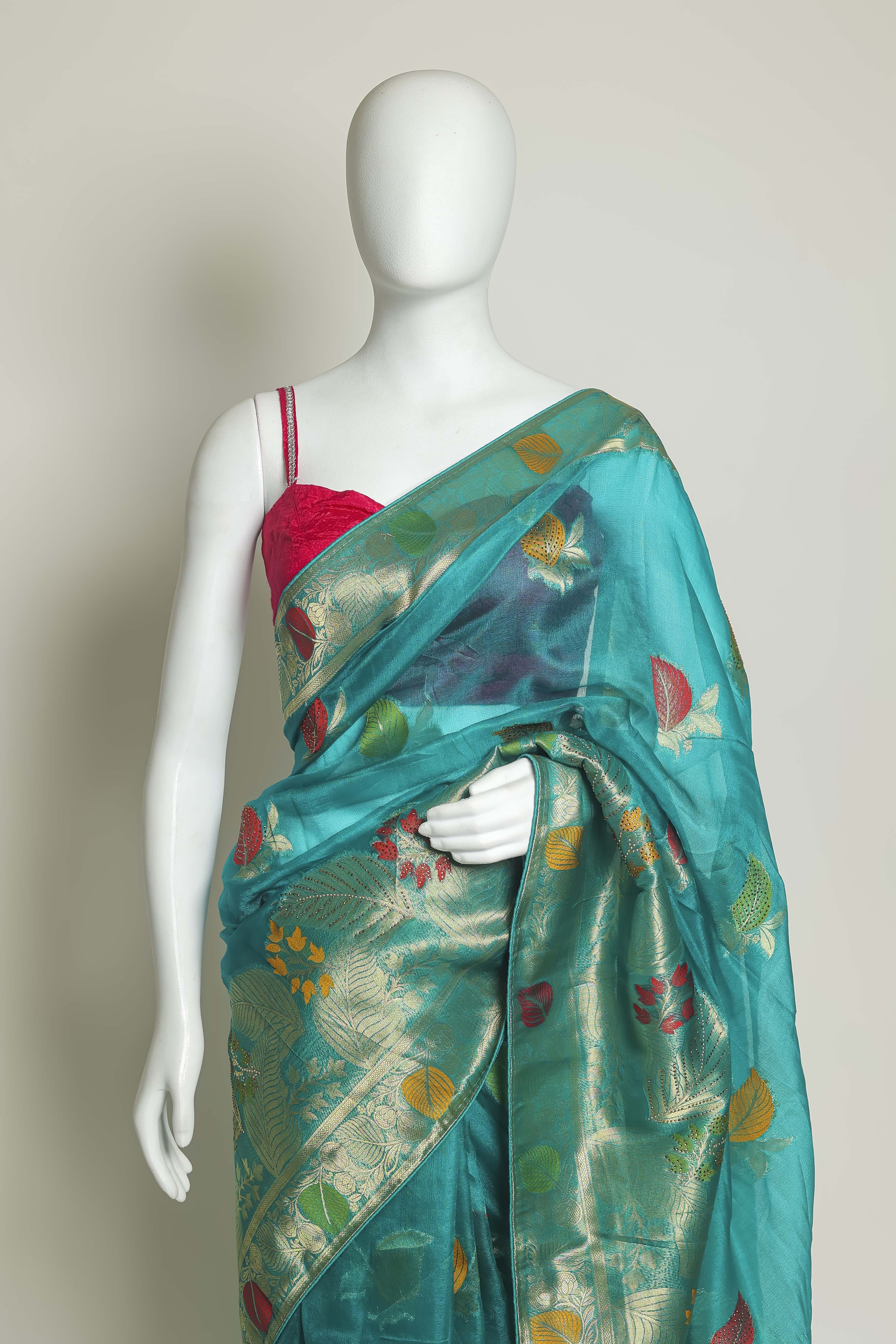 Radiant Firozi Art Organza Saree – Swarovski & Meena Embroidery Elegance