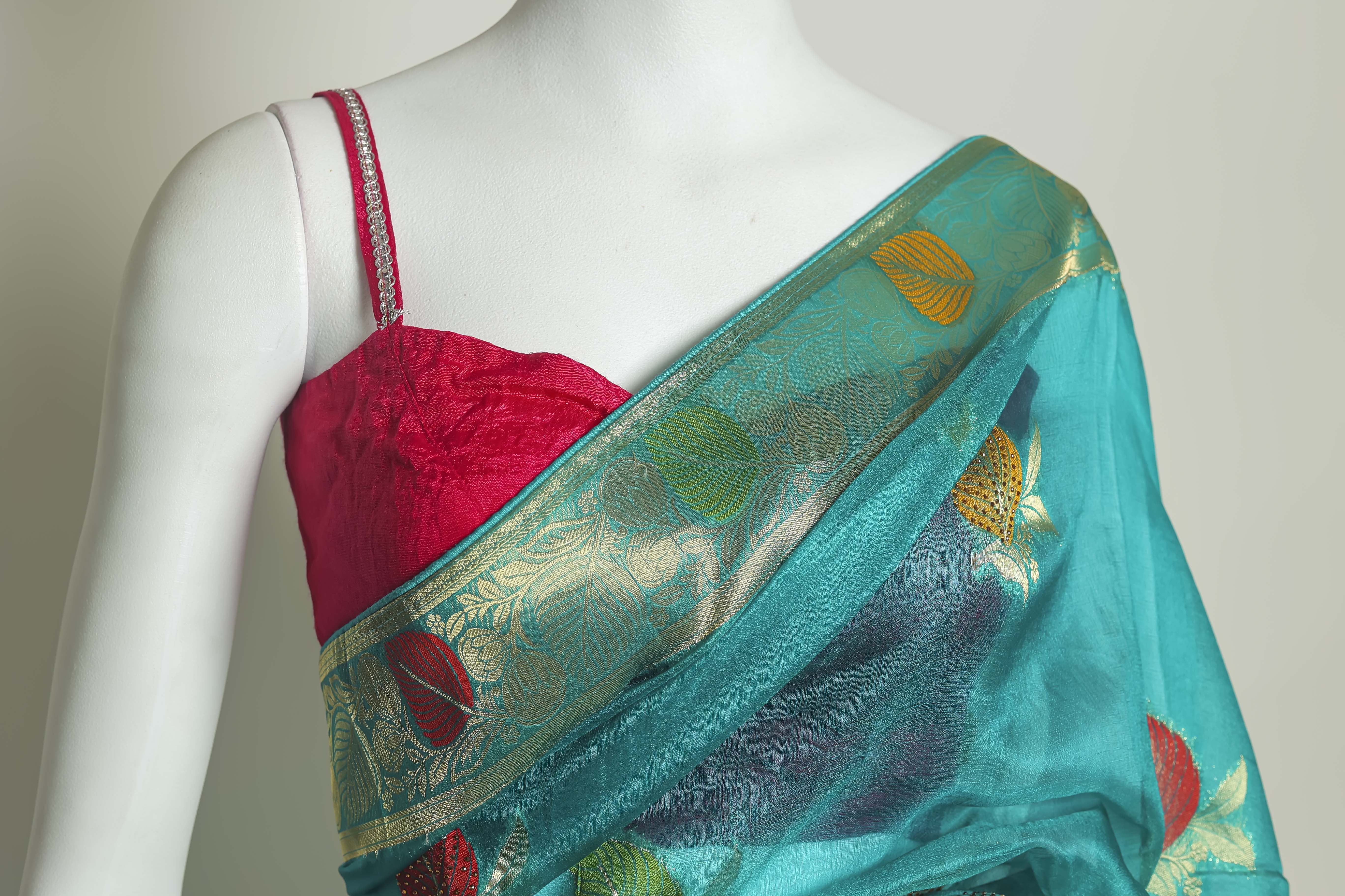 Radiant Firozi Art Organza Saree – Swarovski & Meena Embroidery Elegance