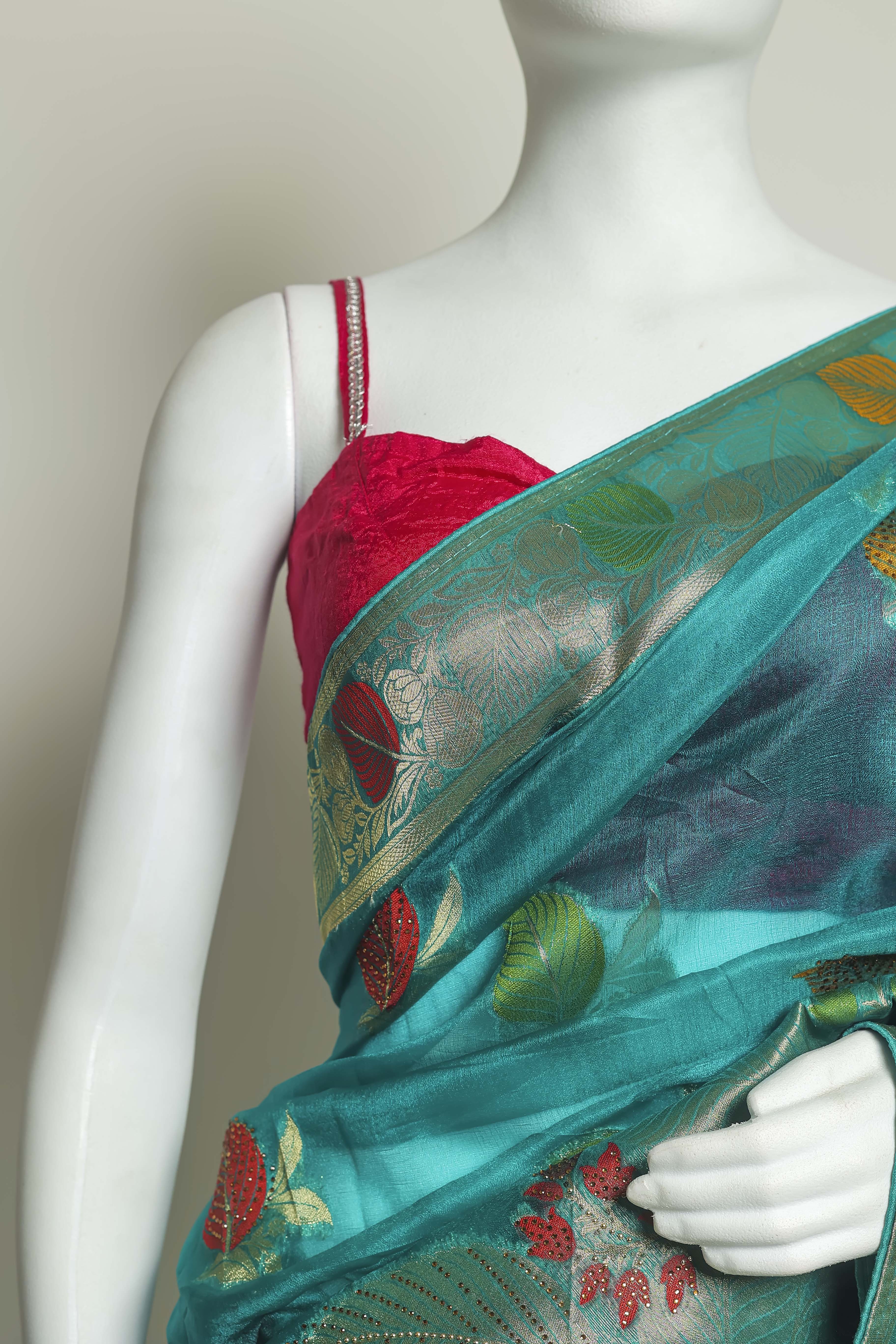 Radiant Firozi Art Organza Saree – Swarovski & Meena Embroidery Elegance