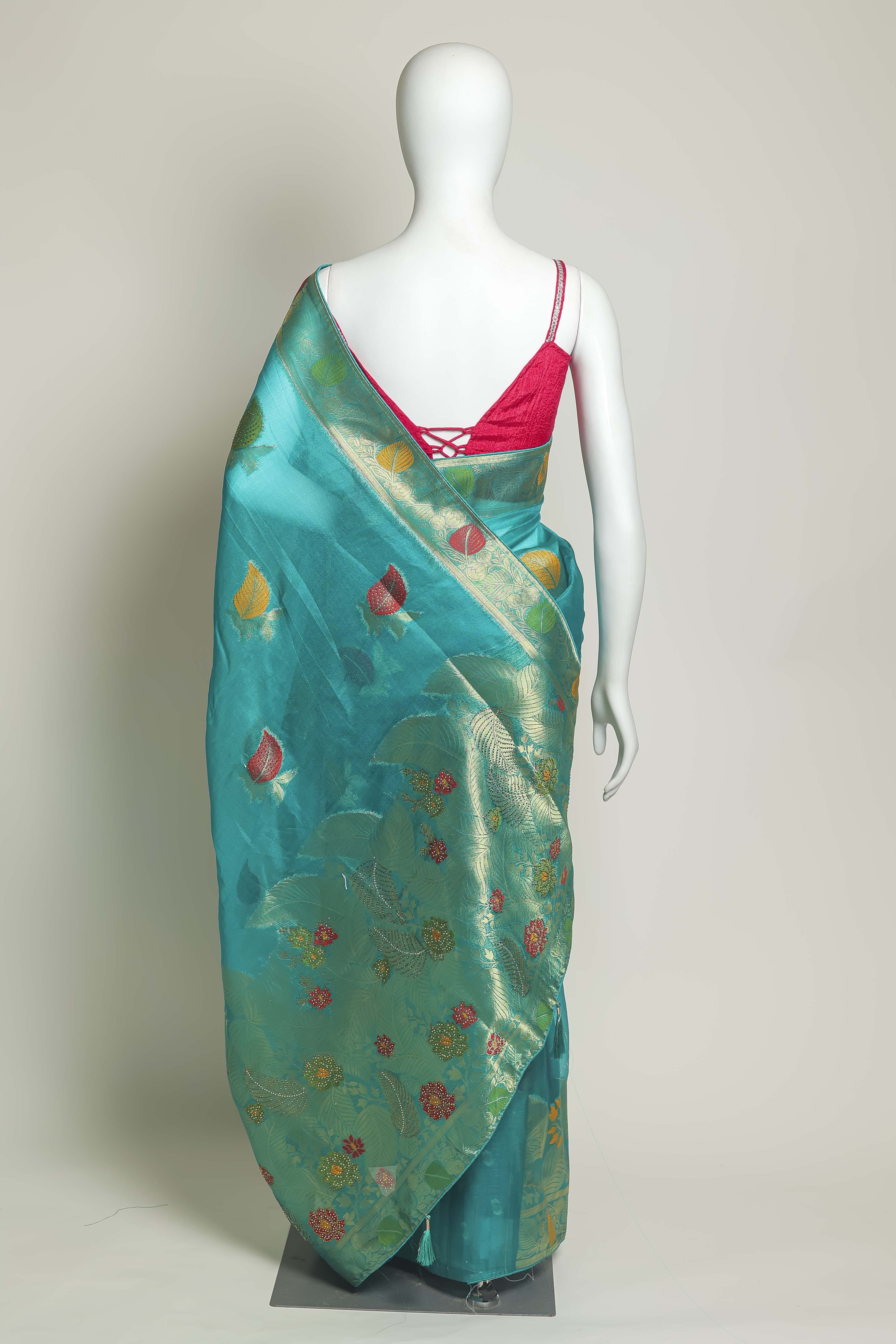 Radiant Firozi Art Organza Saree – Swarovski & Meena Embroidery Elegance